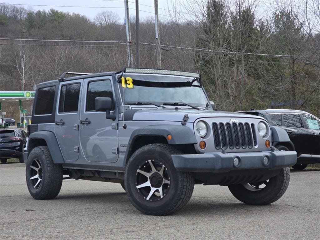 used 2013 Jeep Wrangler Unlimited car, priced at $12,623