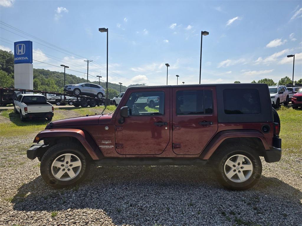 used 2010 Jeep Wrangler Unlimited car, priced at $10,000