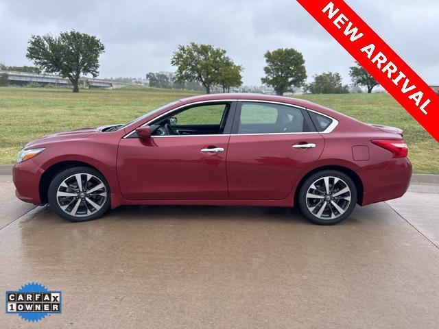 used 2016 Nissan Altima car, priced at $14,000