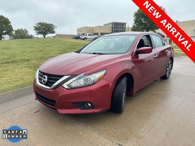 used 2016 Nissan Altima car, priced at $14,000