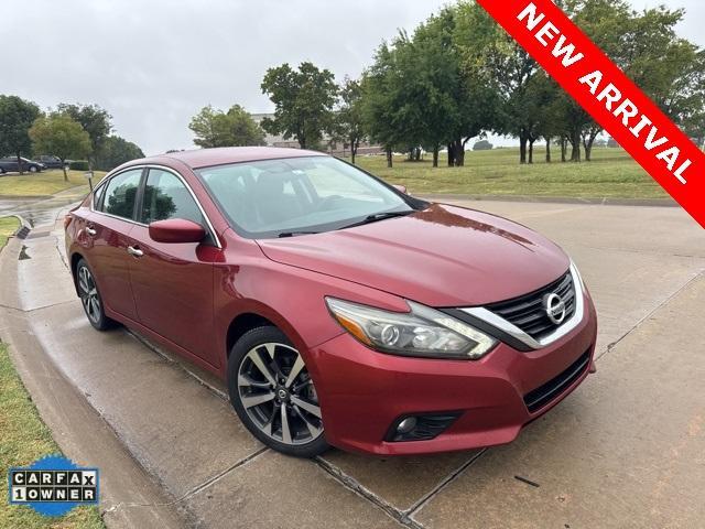 used 2016 Nissan Altima car, priced at $14,000