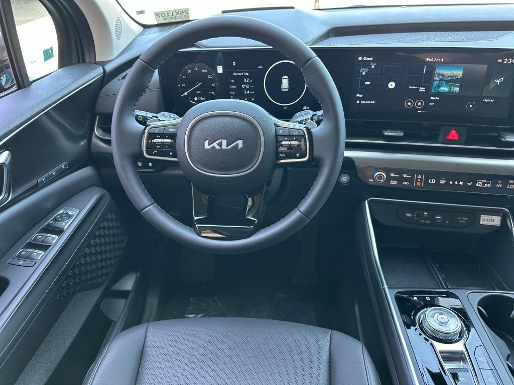 new 2025 Kia Carnival Hybrid car, priced at $57,670