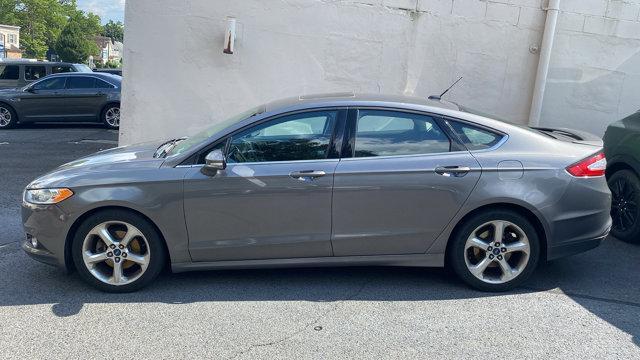 used 2014 Ford Fusion car, priced at $5,877