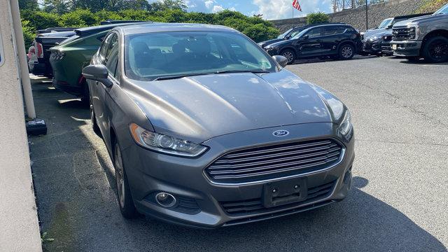 used 2014 Ford Fusion car, priced at $5,877