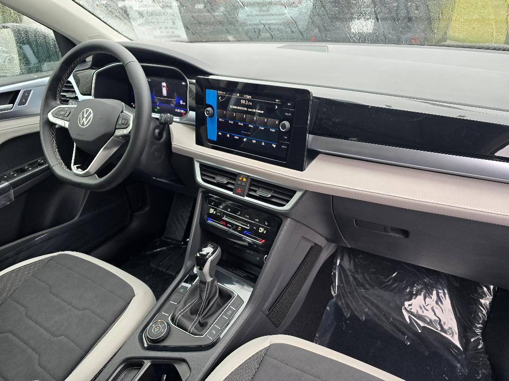new 2025 Volkswagen Taos car, priced at $30,999