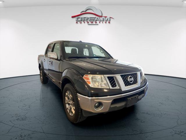 used 2014 Nissan Frontier car, priced at $17,000