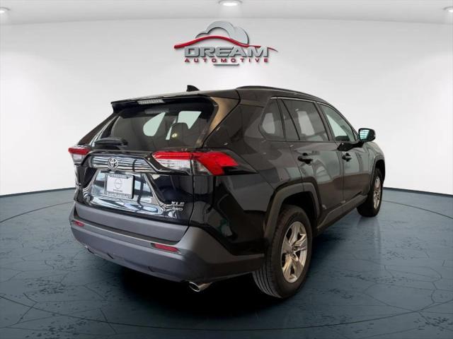 used 2023 Toyota RAV4 car, priced at $30,500