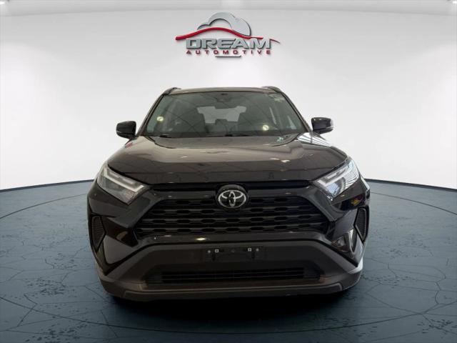 used 2023 Toyota RAV4 car, priced at $30,500