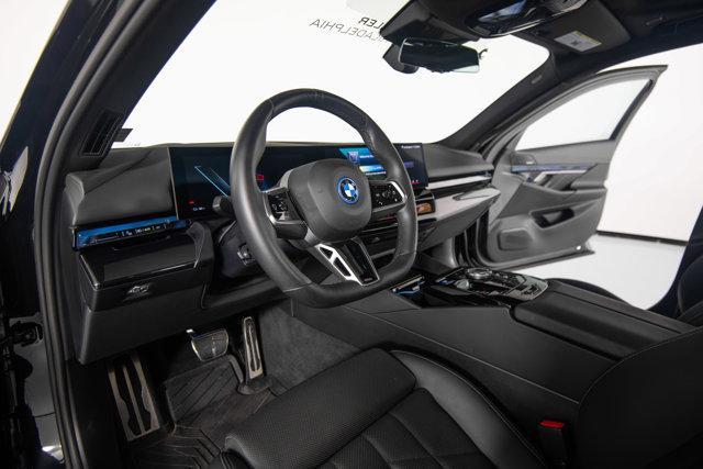 used 2025 BMW i5 car, priced at $62,995