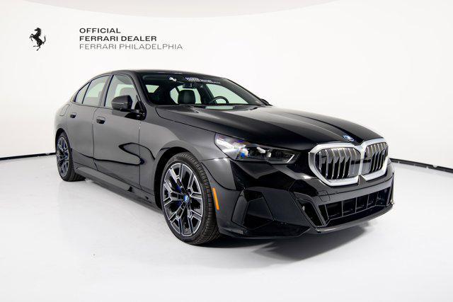 used 2025 BMW i5 car, priced at $62,995