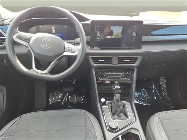 new 2025 Volkswagen Taos car, priced at $31,046
