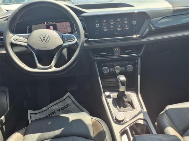 used 2022 Volkswagen Taos car, priced at $25,000
