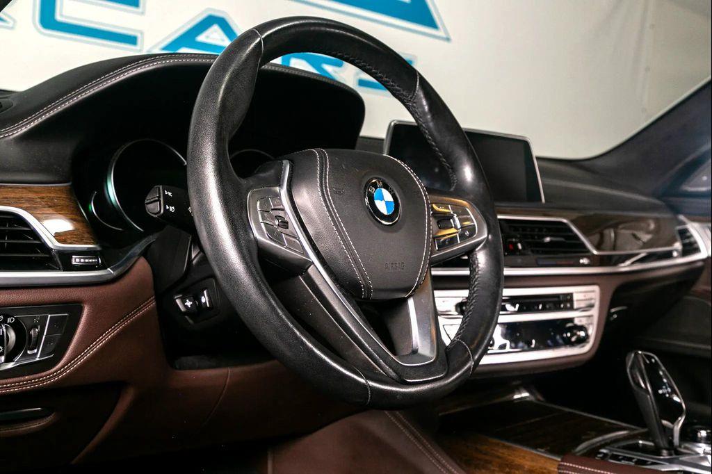 used 2017 BMW 750 car, priced at $22,995