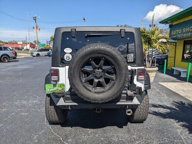 used 2014 Jeep Wrangler Unlimited car, priced at $18,499