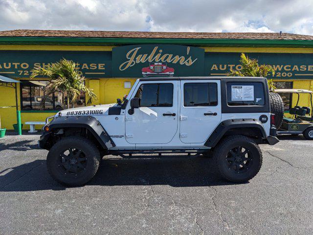 used 2014 Jeep Wrangler Unlimited car, priced at $18,499