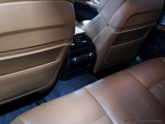 used 2015 BMW M5 car, priced at $35,999