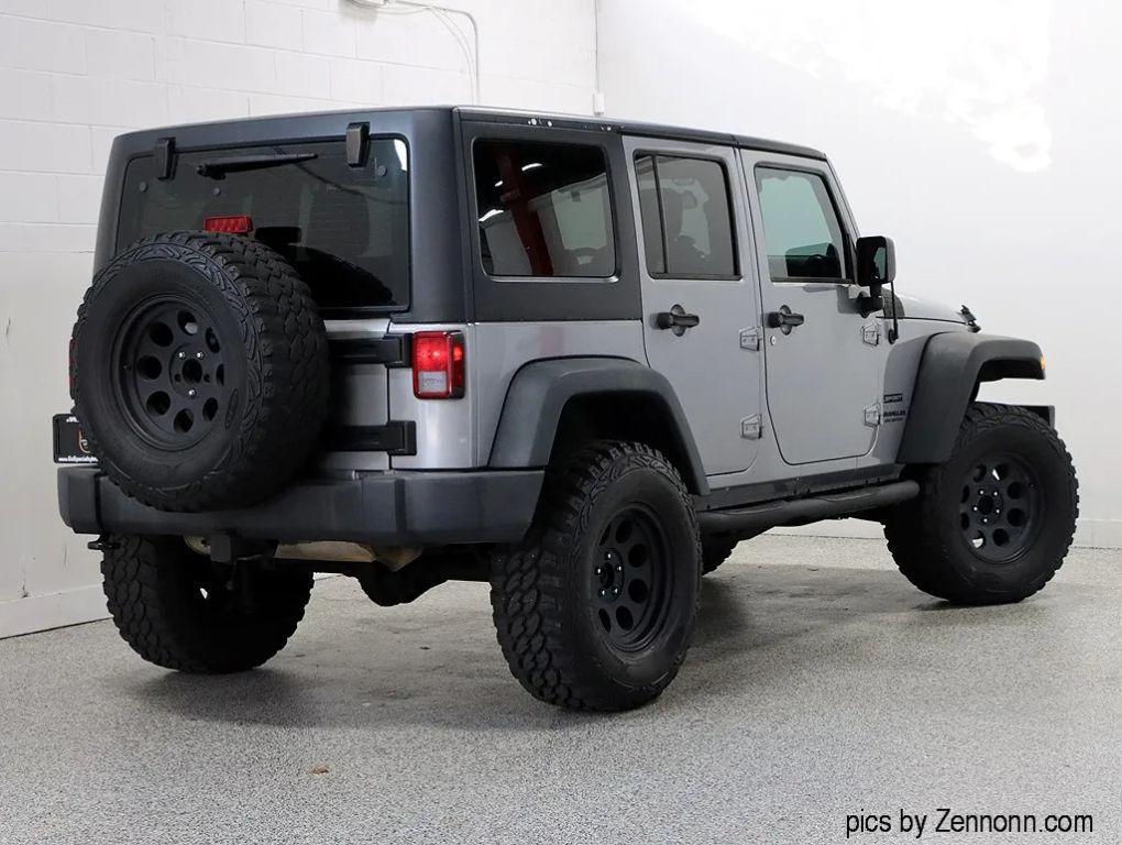 used 2013 Jeep Wrangler Unlimited car, priced at $16,999