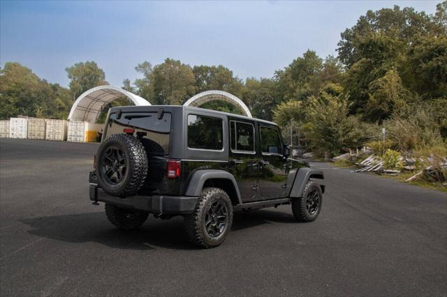 used 2014 Jeep Wrangler Unlimited car, priced at $17,999