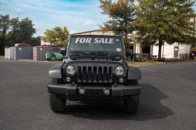used 2014 Jeep Wrangler Unlimited car, priced at $17,999