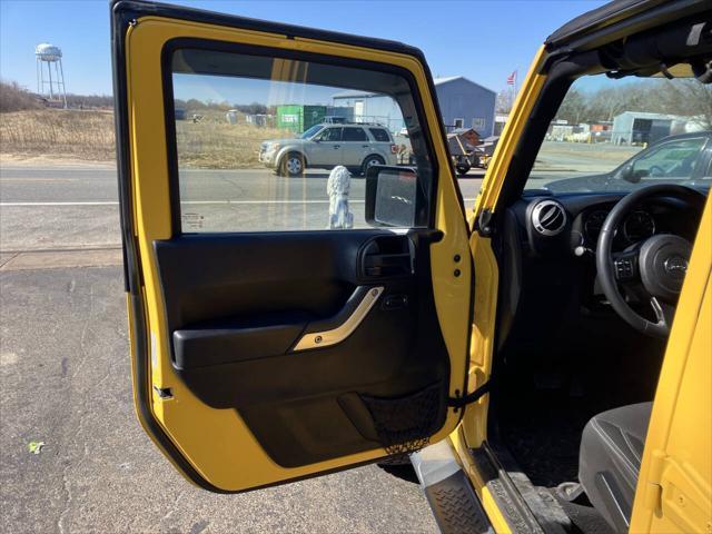 used 2015 Jeep Wrangler Unlimited car, priced at $13,995