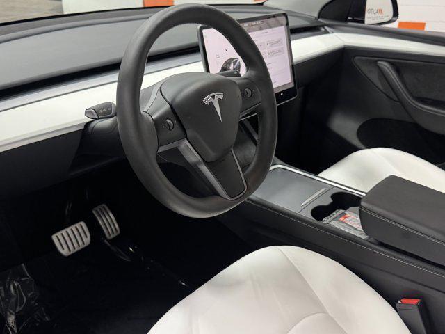 used 2024 Tesla Model Y car, priced at $39,100