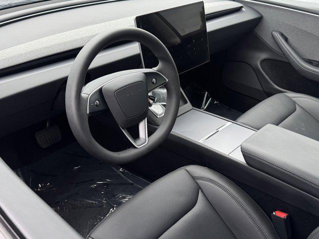 used 2024 Tesla Model 3 car, priced at $34,500