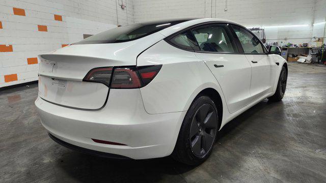 used 2023 Tesla Model 3 car, priced at $23,545