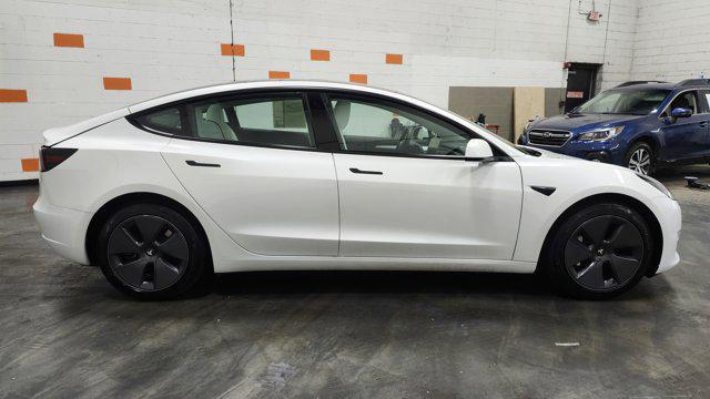 used 2023 Tesla Model 3 car, priced at $23,545