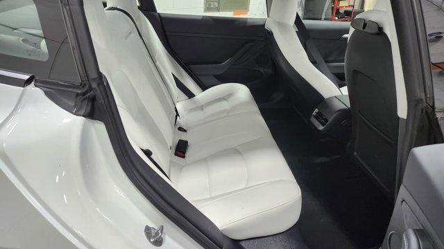 used 2023 Tesla Model 3 car, priced at $23,545