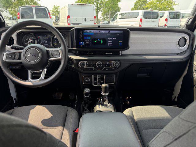 used 2024 Jeep Wrangler 4xe car, priced at $34,100