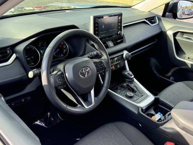 used 2021 Toyota RAV4 Hybrid car, priced at $28,000