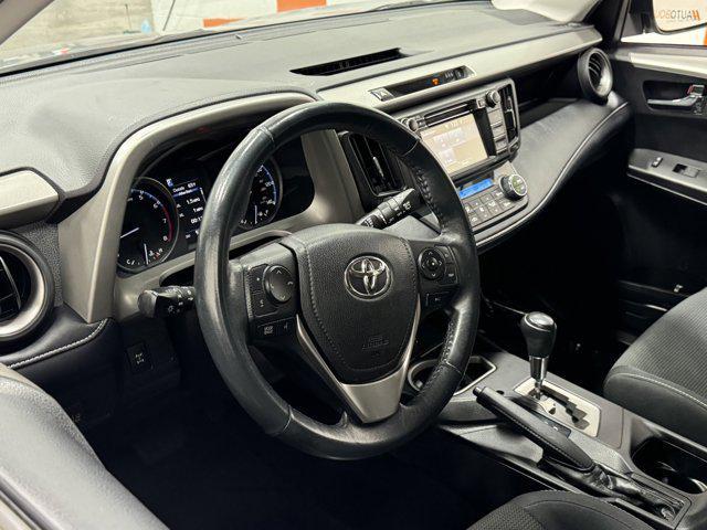 used 2018 Toyota RAV4 car, priced at $16,100