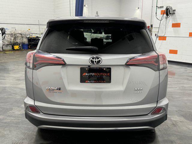 used 2018 Toyota RAV4 car, priced at $16,100