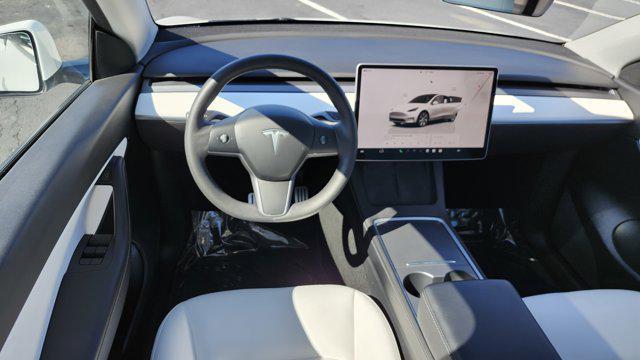 used 2022 Tesla Model Y car, priced at $24,100