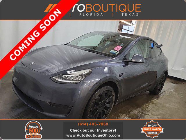 used 2023 Tesla Model Y car, priced at $27,045
