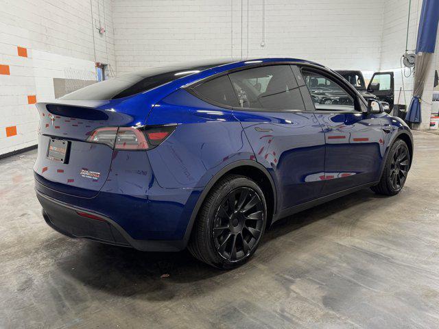 used 2024 Tesla Model Y car, priced at $32,000
