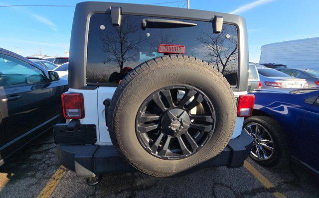 used 2015 Jeep Wrangler Unlimited car, priced at $15,900