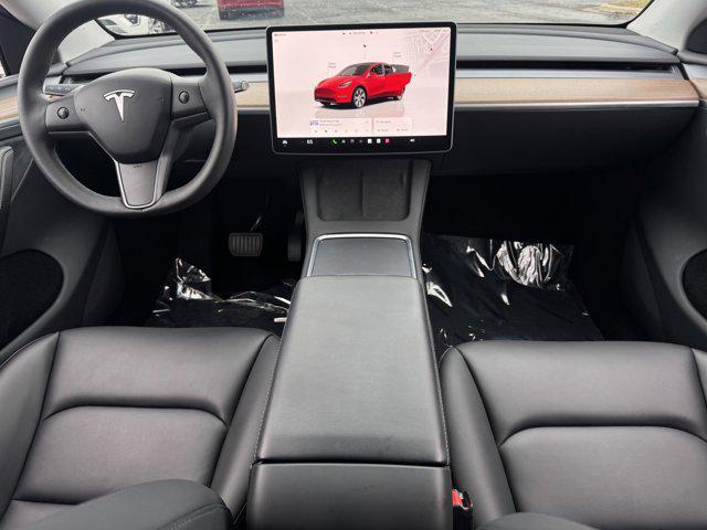 used 2023 Tesla Model Y car, priced at $33,045