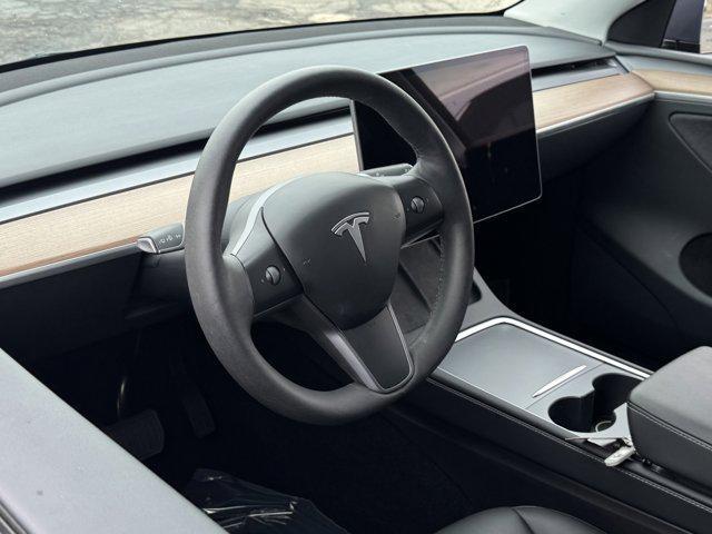 used 2023 Tesla Model Y car, priced at $33,045