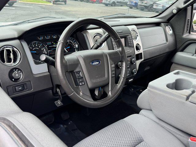 used 2014 Ford F-150 car, priced at $15,200