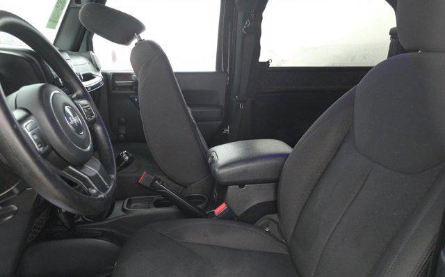 used 2015 Jeep Wrangler car, priced at $17,545