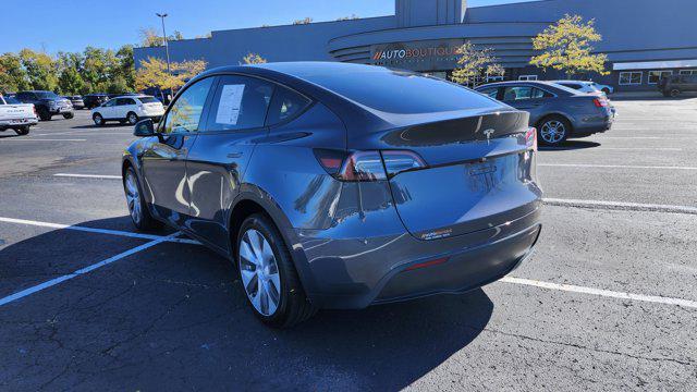 used 2023 Tesla Model Y car, priced at $28,000