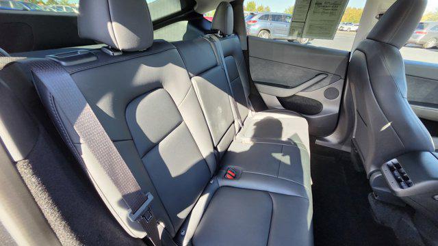 used 2023 Tesla Model Y car, priced at $28,000