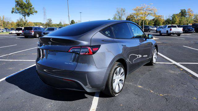 used 2023 Tesla Model Y car, priced at $28,000