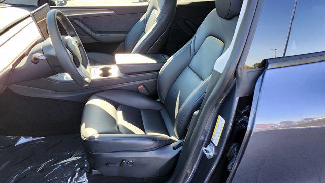 used 2023 Tesla Model Y car, priced at $28,000