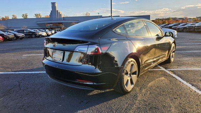used 2023 Tesla Model 3 car, priced at $21,000