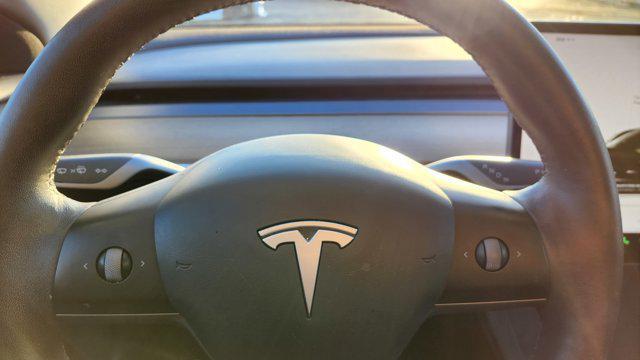 used 2023 Tesla Model 3 car, priced at $21,000