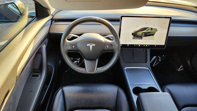 used 2023 Tesla Model 3 car, priced at $21,000