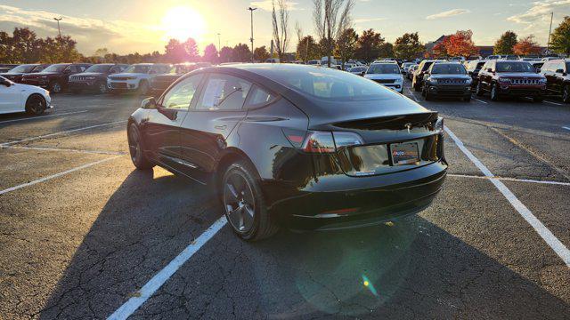 used 2023 Tesla Model 3 car, priced at $21,000