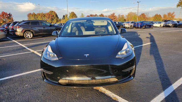 used 2023 Tesla Model 3 car, priced at $21,000